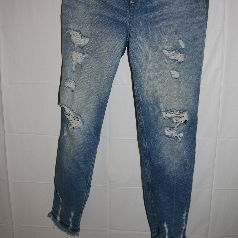 light blue ripped jeans